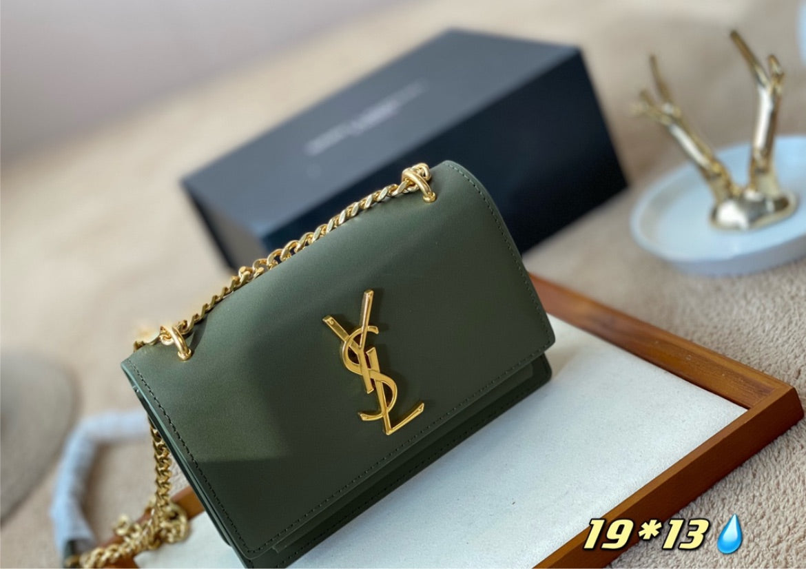 Green YSL woman shoulder handbag